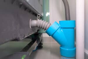 washer drain clogged, unclog washer drain, prevent clogged washer drain, DIY methods, professional plumber, Courtesy Plumbing