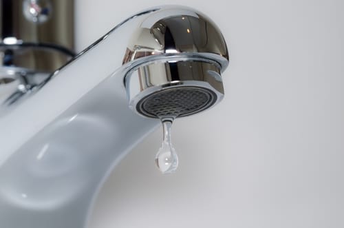 dripping faucet, fix faucet drip, prevent dripping, water conservation, utility bills, expert plumbing, DIY solutions, plumbing tips,